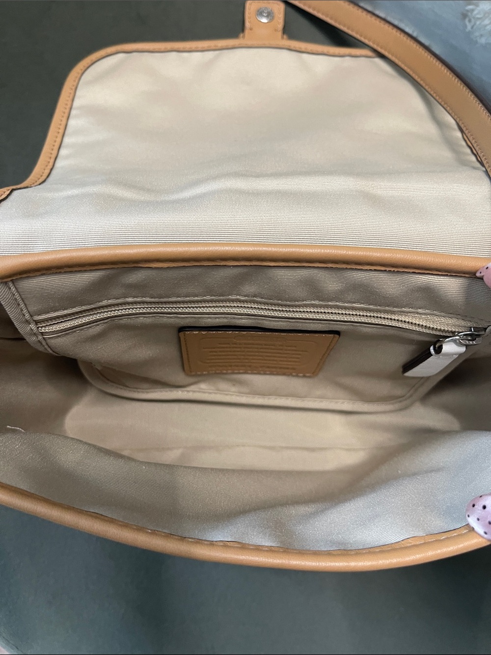 Coach Hadley leather crossbody bag in a navy, tan, and white colorblock design. - Picture 4 of 11